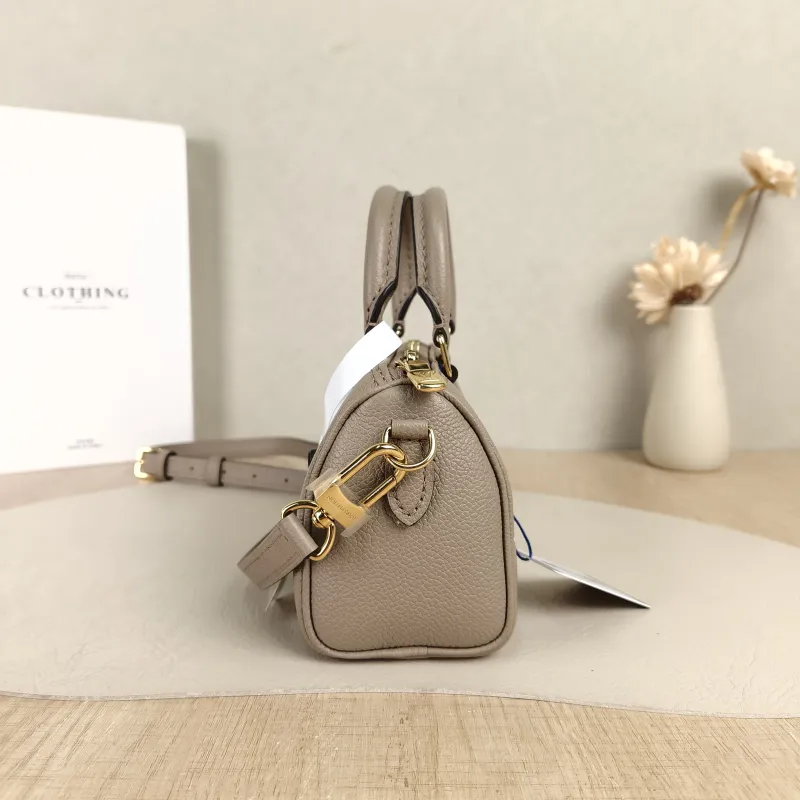 Louis Vuitton Crossbody Bag Speedy Nano · White Empreinte Embossed Calfskin Monogramnano16 × 7.5 × 10 cm — detail view 7 of 11