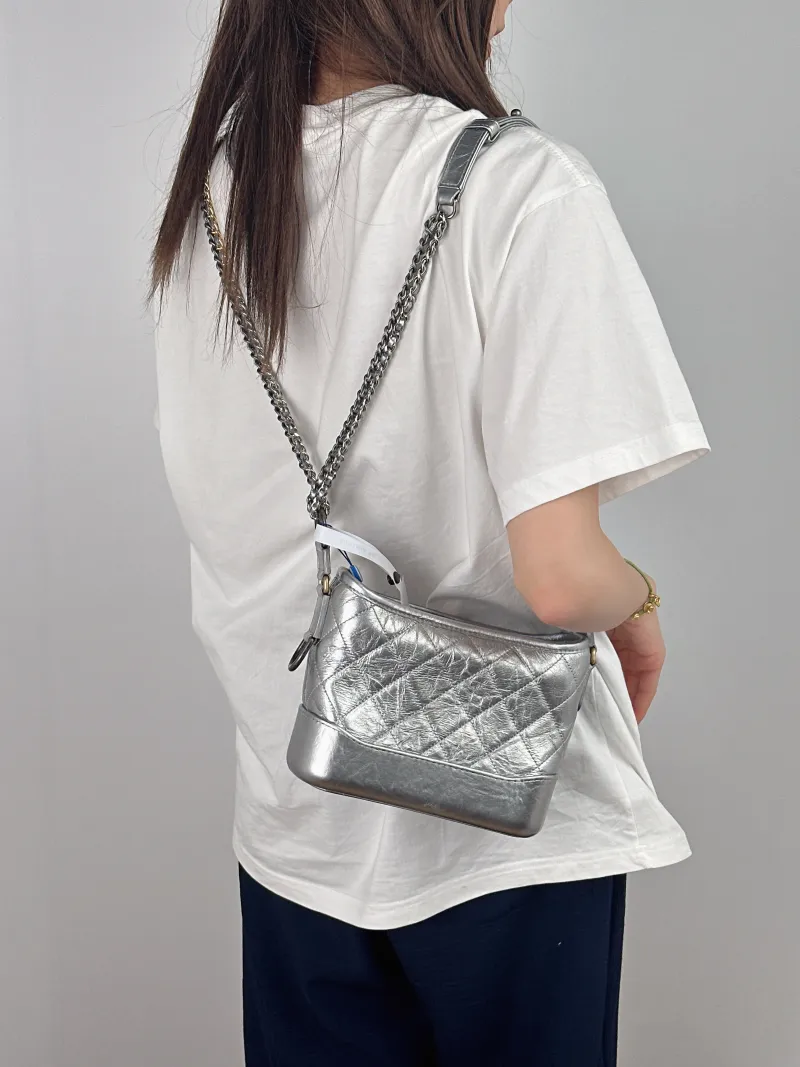 Chanel Crossbody Bag Gabrielle Gabrielle Bag Silver CC alfskin Small20 × 8 × 15 cm — on-model view 2 of 2