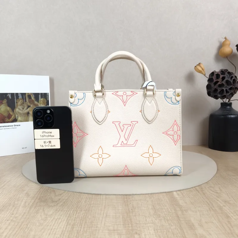 Louis Vuitton Top Handle Bag Onthego White · Embroidered Calfskin Small25 × 11.5 × 19 cm — cover view 2 of 5