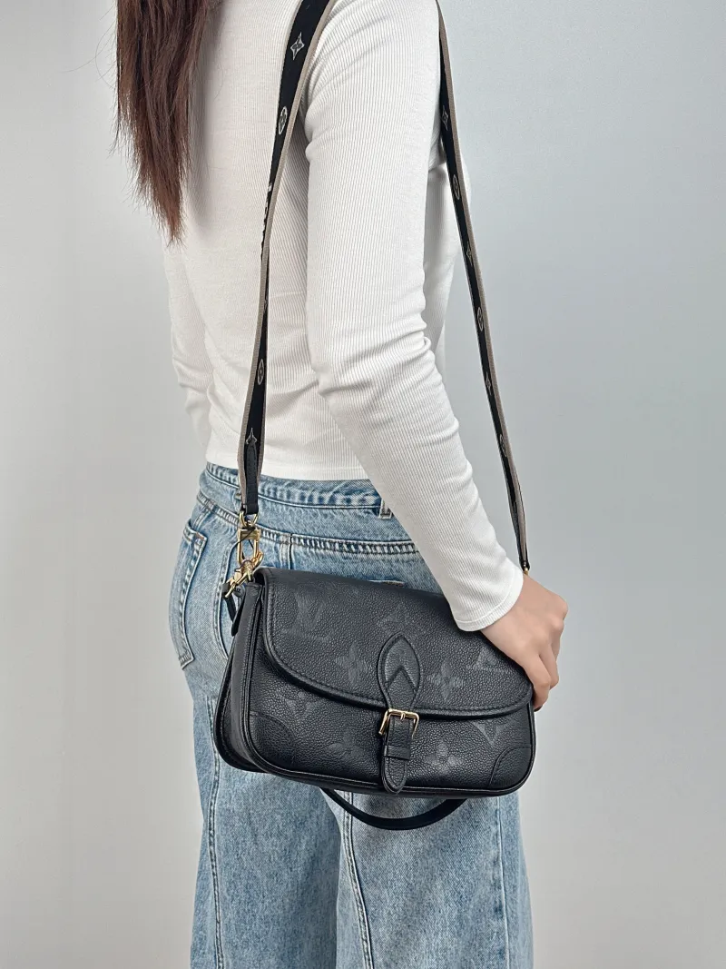 Louis Vuitton Crossbody Bag Diane Baguette Bag Black Monogram Empreinte Embossed Calfskin Small 24 × 9 × 15 cm — on-model view 3 of 3