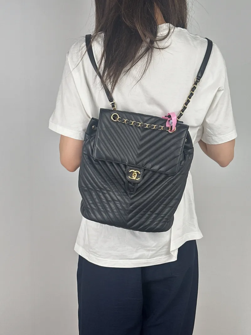 Chanel Backpack V Backpack Black with Gold-Tone Hardware Calfskin One Size24 × 13 × 27 cm — on-model view 1 of 3