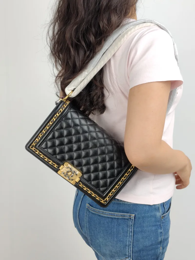 Chanel Crossbody Bag Le Boy​ Black Grained Calfskin Medium 25 × 9 × 15 cm — on-model view 2 of 2