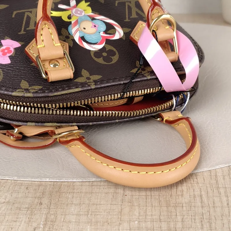 Louis Vuitton Crossbody Bag Alma Nano vivenne Monogram PVC nano 18 × 8 × 12 cm — detail view 6 of 11