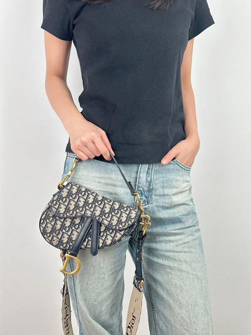 DIOR Top Handle Bag Saddle Blue Canvas Mini 19 × 6 × 15 cm — on-model view 3 of 3