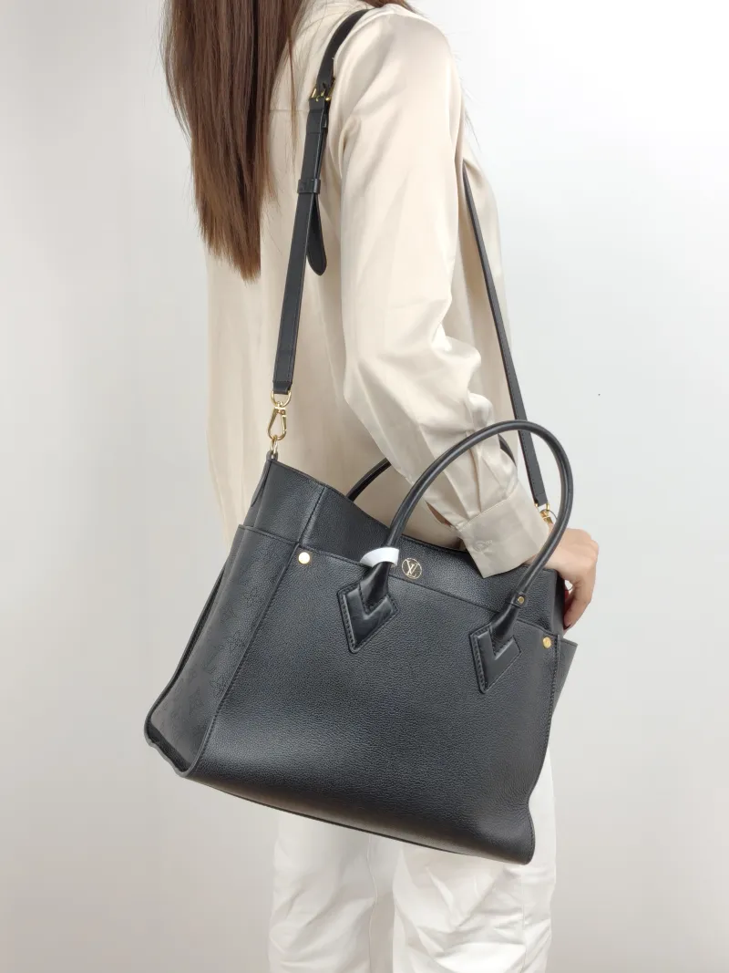 Louis Vuitton Shoulder Bag On My Side Black Calfskin Large 34 × 17 × 28 cm — on-model view 2 of 2