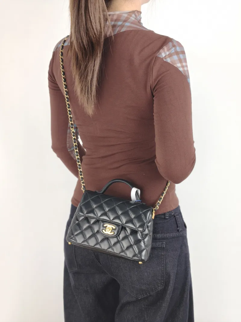 Chanel Crossbody Bag 25p Top Handle Crossbody Bag Black Lambskin Small 22 × 6 × 11.5 cm — on-model view 2 of 3