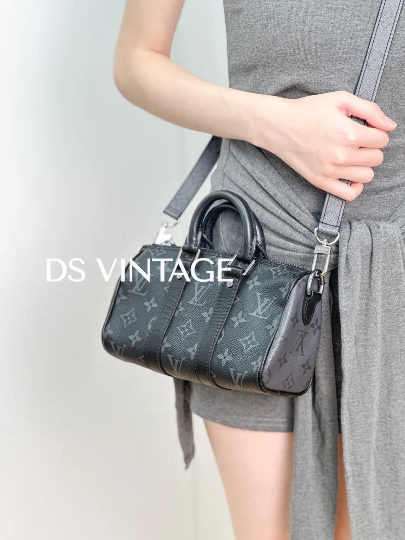 Louis Vuitton Crossbody Bag Keepall XS Monogram PVC Mini 21 × 9 × 12 cm — on-model view 5 of 6