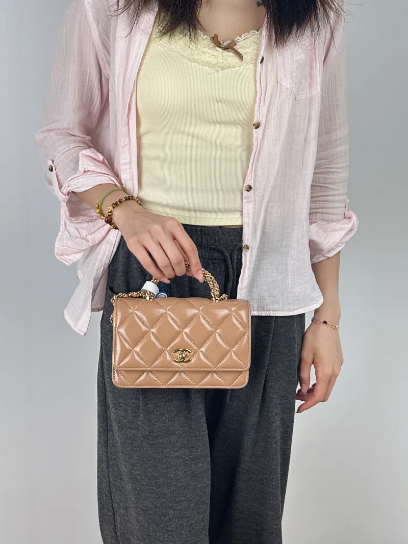 Chanel Crossbody Bag woc Brown Lambskin One Size19.2 × 3.5 × 12.3 cm — on-model view 1 of 2