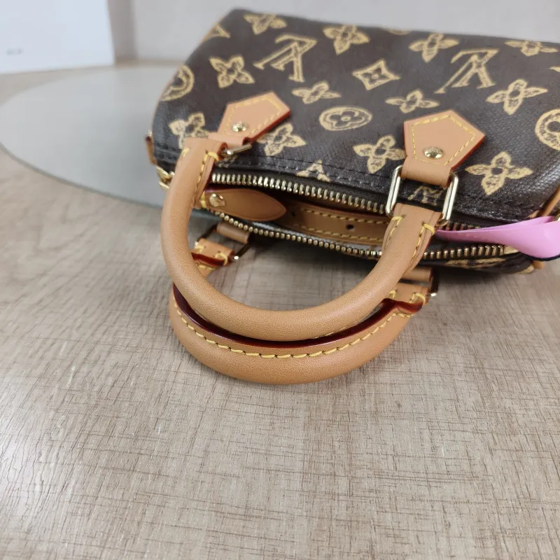 Louis Vuitton Crossbody Bag Speedy Nano PVC nano 16 × 7.5 × 10 cm — detail view 2 of 12
