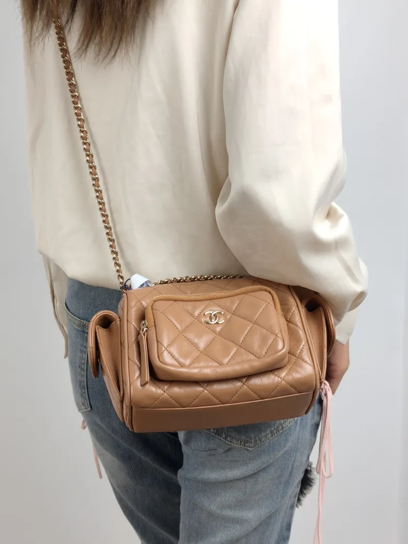 Chanel Crossbody Bag Camera Bag Taupe Lambskin One Size 24 × 17 × 18 cm — on-model view 2 of 3