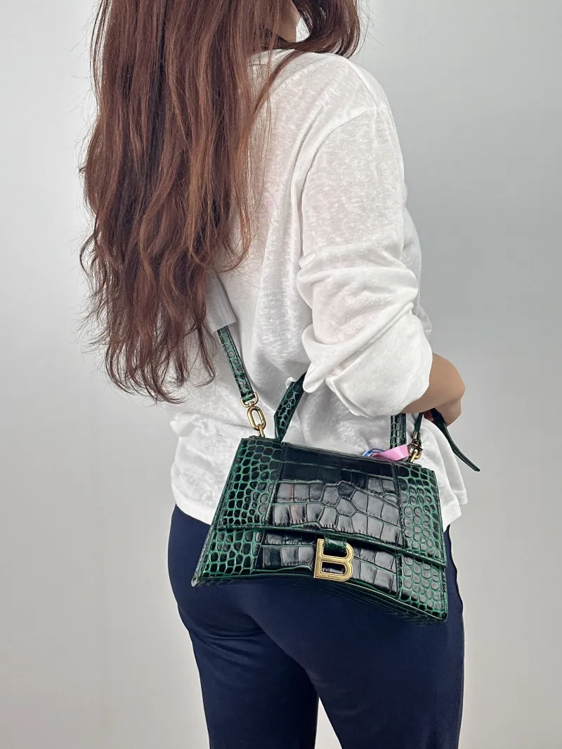 BALENCIAGA Crossbody Bag Hourglass Hourglass Bag Green Calfskin Small 23 × 10 × 14 cm — on-model view 2 of 2