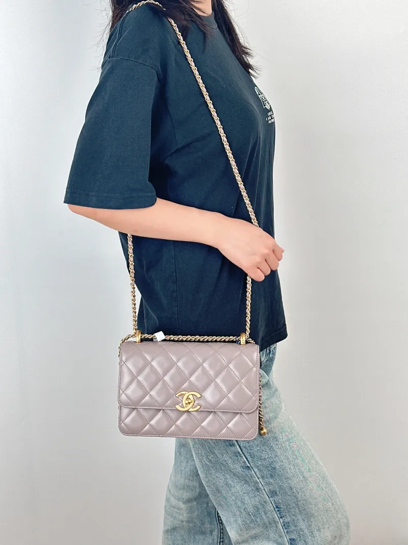 Chanel Crossbody Bag woc Calfskin Medium22 × 8 × 14.5 cm — on-model view 2 of 3