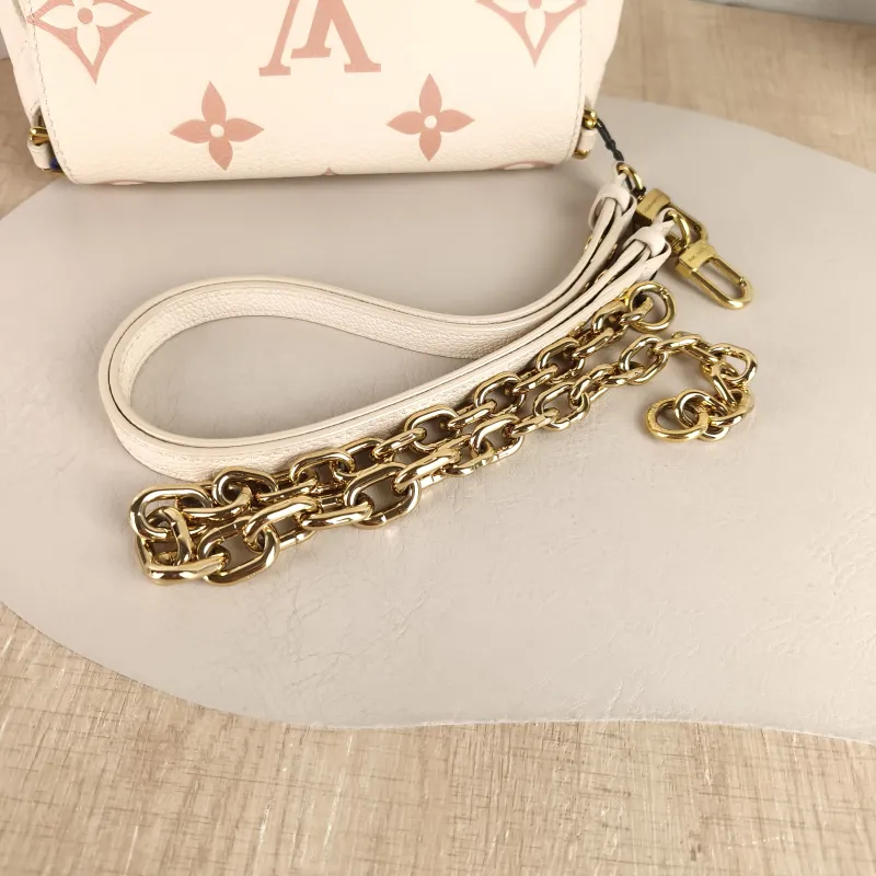 Louis Vuitton Crossbody Bag Favorite White · Pink Empreinte Embossed Calfskin Medium 24 × 9 × 14 cm — detail view 11 of 11