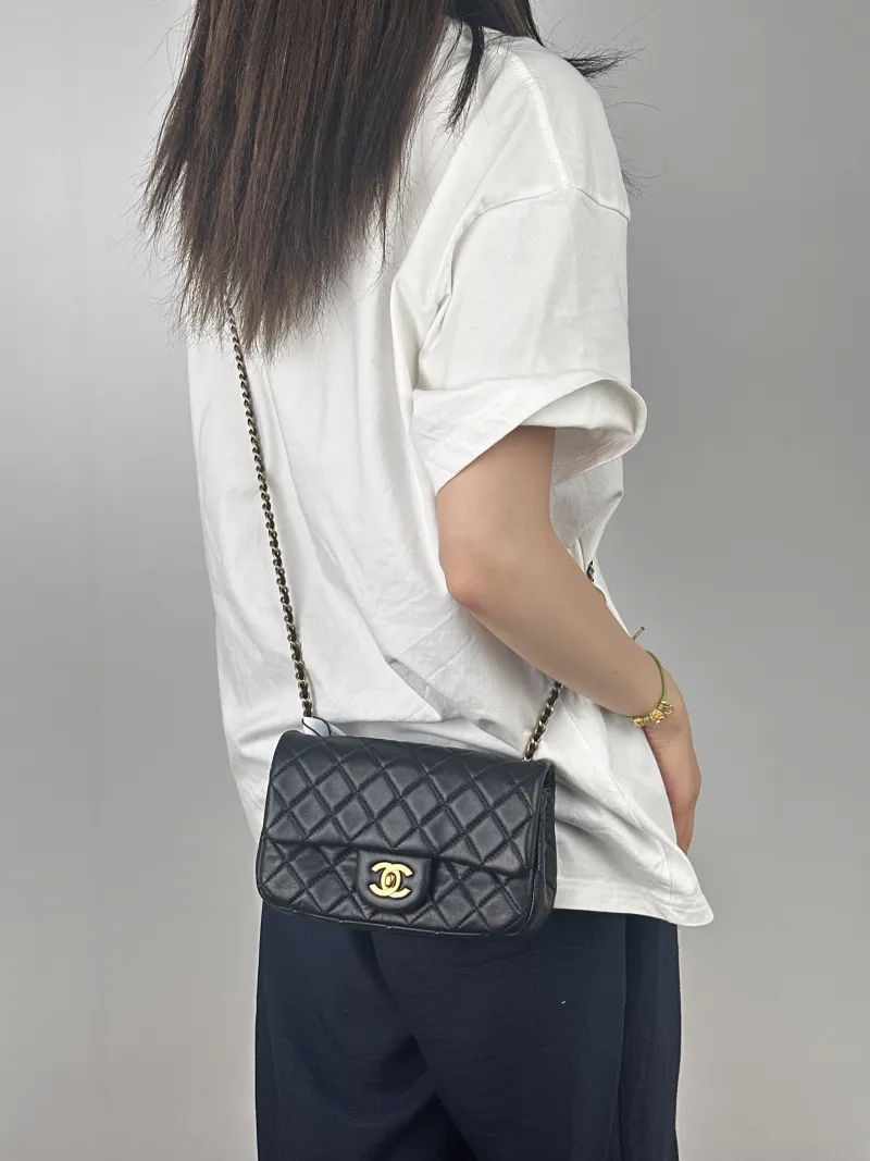 Chanel Crossbody Bag Classic Flap Large Mini CF Mini Black with Gold-Tone Hardware Lambskin mini20 × 6 × 12 cm — on-model view 2 of 2