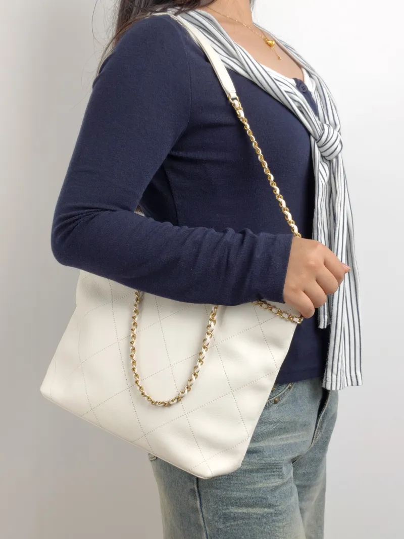 Chanel Shoulder Bag Tote Bag White Gold Calfskin One Size 25 × 7 × 24 cm 31 — on-model view 2 of 2