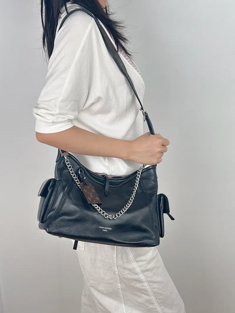 Louis Vuitton Crossbody Bag Carryall Vibe Black SL ambskin Medium 39 × 15 × 30 cm — on-model view 2 of 3