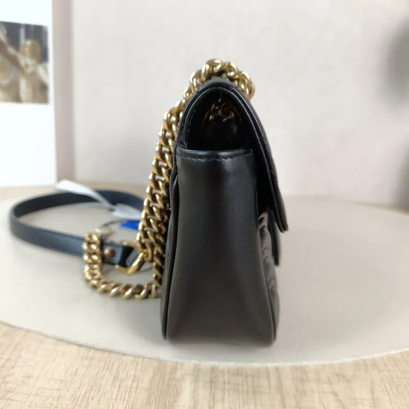 GUCCI Crossbody Bag GG Marmont Small Marmont 22 Black CC alfskin Small 22 × 6 × 13 cm — detail view 1 of 11