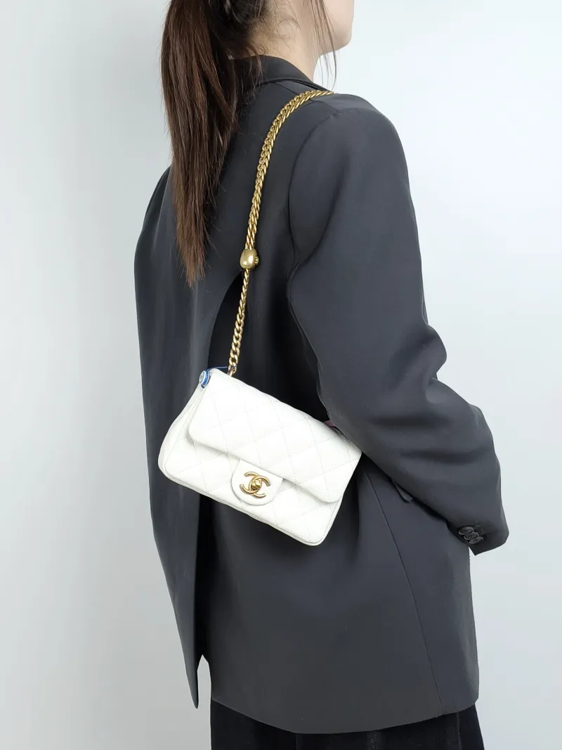 Chanel Crossbody Bag White Grained Calfskin 18 × 5 × 12 cm — on-model view 2 of 2