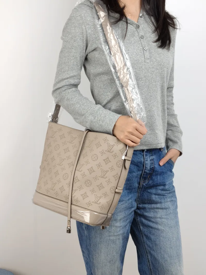 Louis Vuitton Shoulder Bag Flore Bucket Bag Grey Calfskin One Size 28 × 10 × 27 cm — on-model view 2 of 2