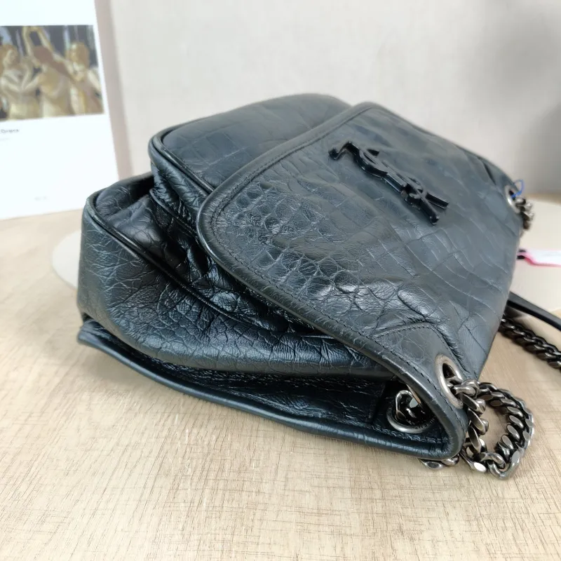 SAINT LAURENT Crossbody Bag Niki D Green Waxed Leather Medium 28 × 8.5 × 20 cm — detail view 10 of 11