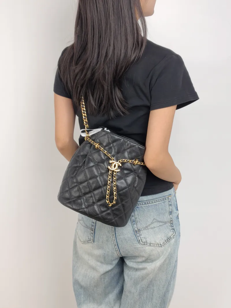 Chanel Shoulder Bag Bucket Bag Black Calfskin One Size 21 × 14 × 24 cm — on-model view 1 of 2