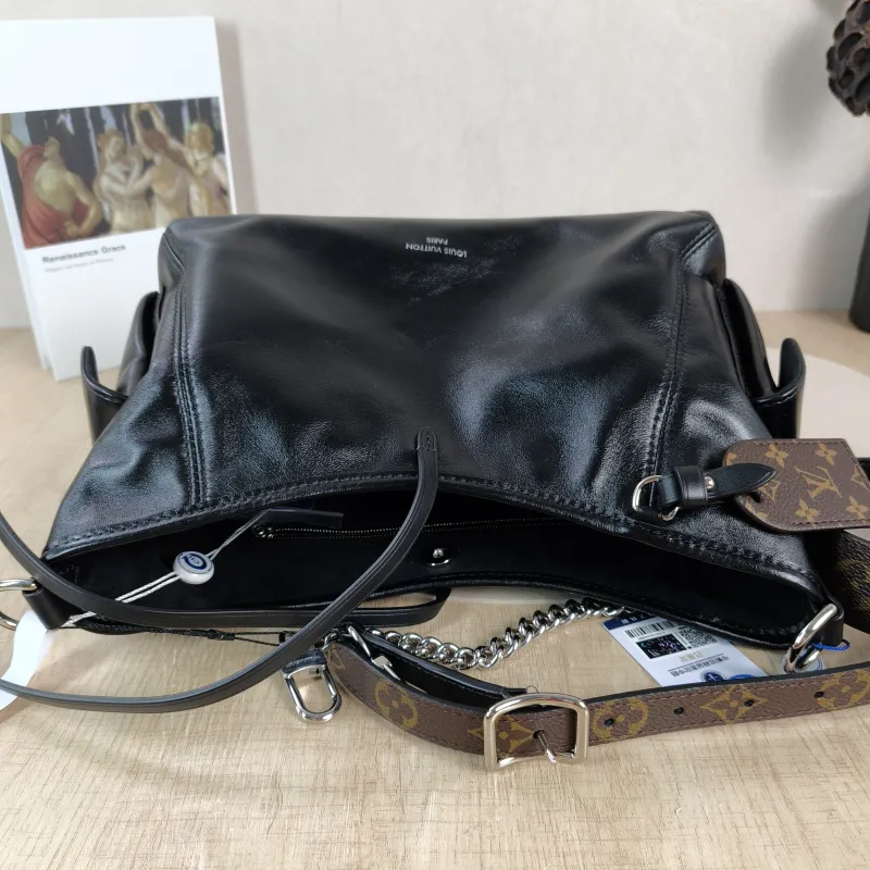 Louis Vuitton Crossbody Bag Carryall Cargo Vibe Black SL ambskin Small 33.5 × 15 × 23 cm — detail view 1 of 10
