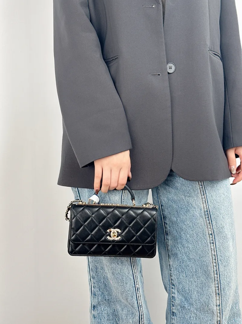 Chanel Crossbody Bag trendy cc woc Black Lambskin Mini 19.2 × 3.5 × 12.3 cm — on-model view 1 of 3