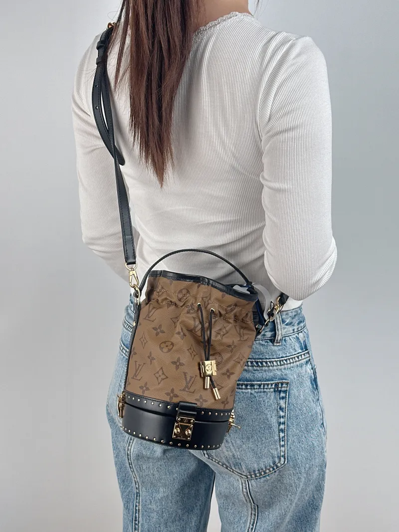 Louis Vuitton Shoulder Bag Petit Noe Edition Bucket Bag Monogram PVC One Size 13.5 × 13.5 × 22 cm — on-model view 3 of 3