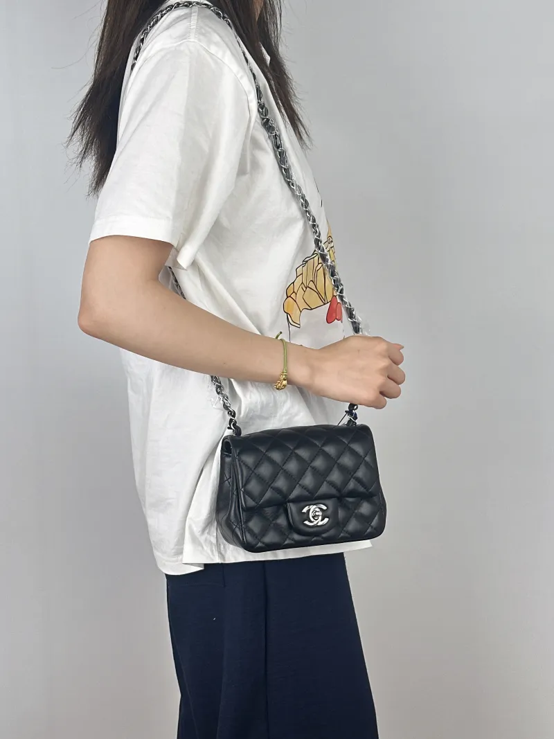 Chanel Crossbody Bag Classic Flap Mini CF Mini Black Lambskin17 × 8 × 13.5 cm — on-model view 2 of 2