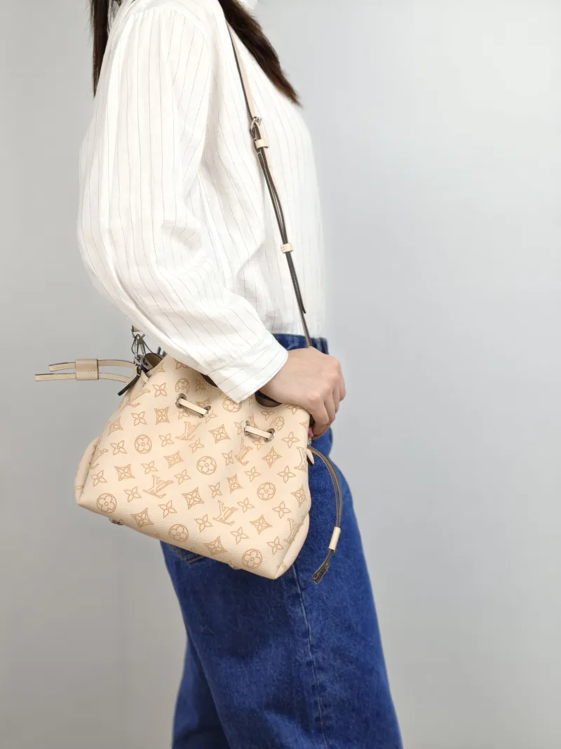 Louis Vuitton Crossbody Bag BELLA Calfskin One Size 22 × 14 × 19 cm — on-model view 2 of 3