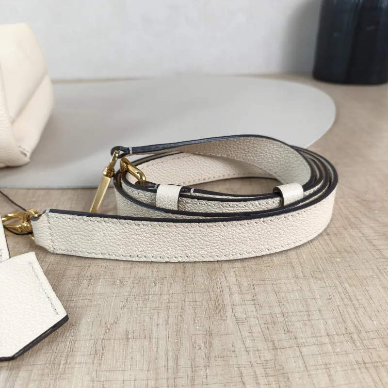 Louis Vuitton Crossbody Bag MADELEINE Beige Monogram Empreinte Embossed Calfskin BB 24 × 8.5 × 17 cm — detail view 10 of 12