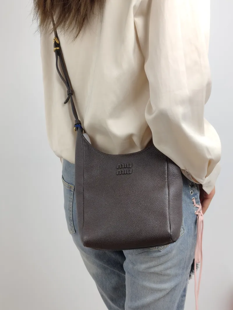 Miumiu Crossbody Bag logo Brown Calfskin One Size 16 × 7 × 17 cm — on-model view 2 of 2