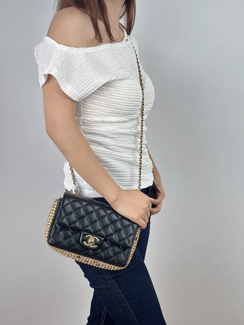 Chanel Crossbody Bag Pearl Crossbody Bag Black Lambskin One Size20 × 5 × 13 cm — on-model view 1 of 2