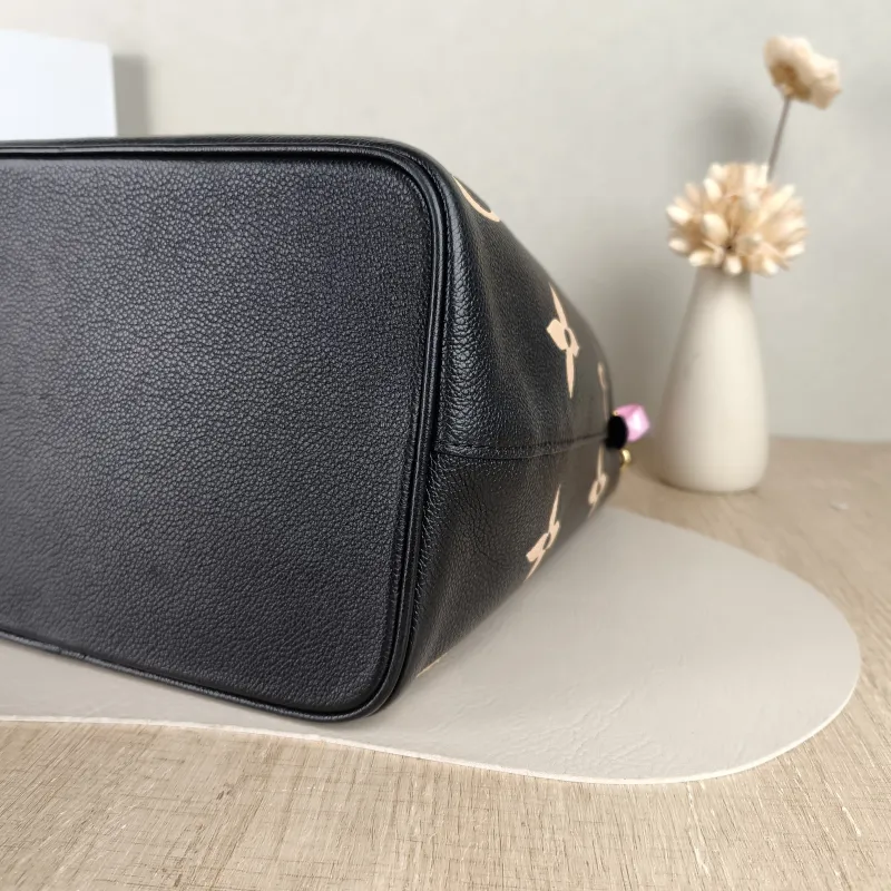 Louis Vuitton Shoulder Bag NÉONOÉ Bucket Bag Black · White Monogram Empreinte Embossed Calfskin Medium 26 × 17.5 × 26 cm — detail view 11 of 11