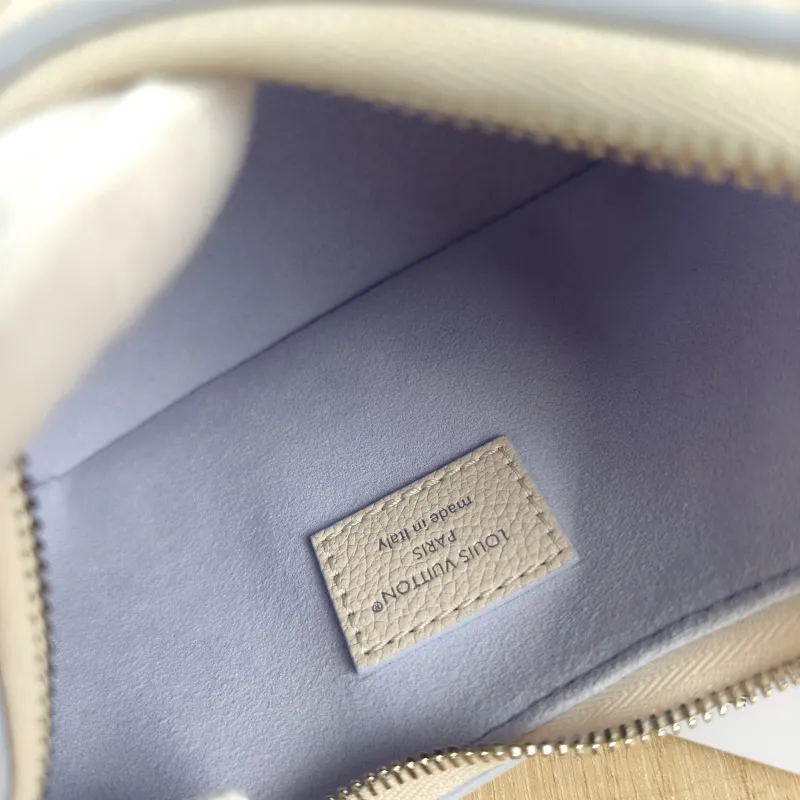 Louis Vuitton Crossbody Bag Boulogne White · Calfskin nano 19 × 8 × 13 cm — detail view 10 of 10