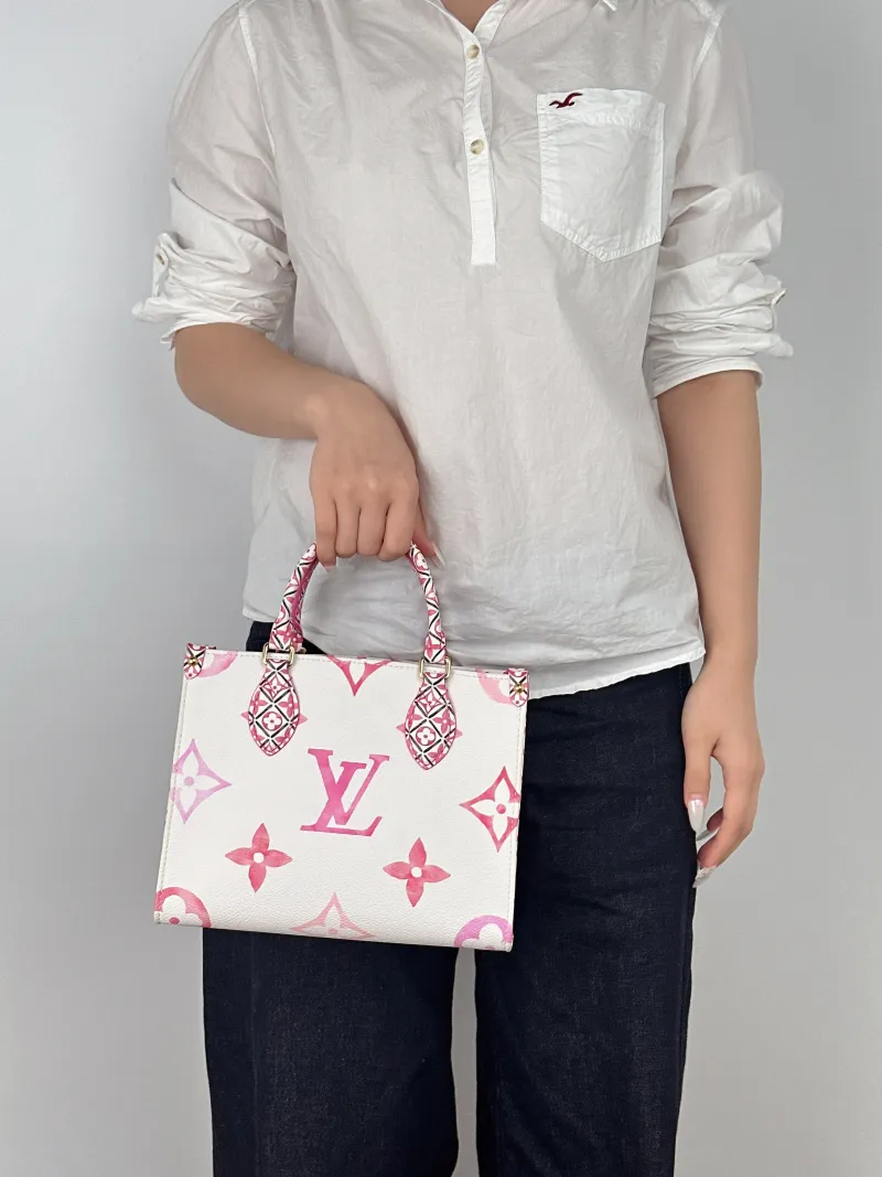 Louis Vuitton Shoulder Bag Onthego Collection PVC Small25 × 11.5 × 19 cm — on-model view 3 of 3