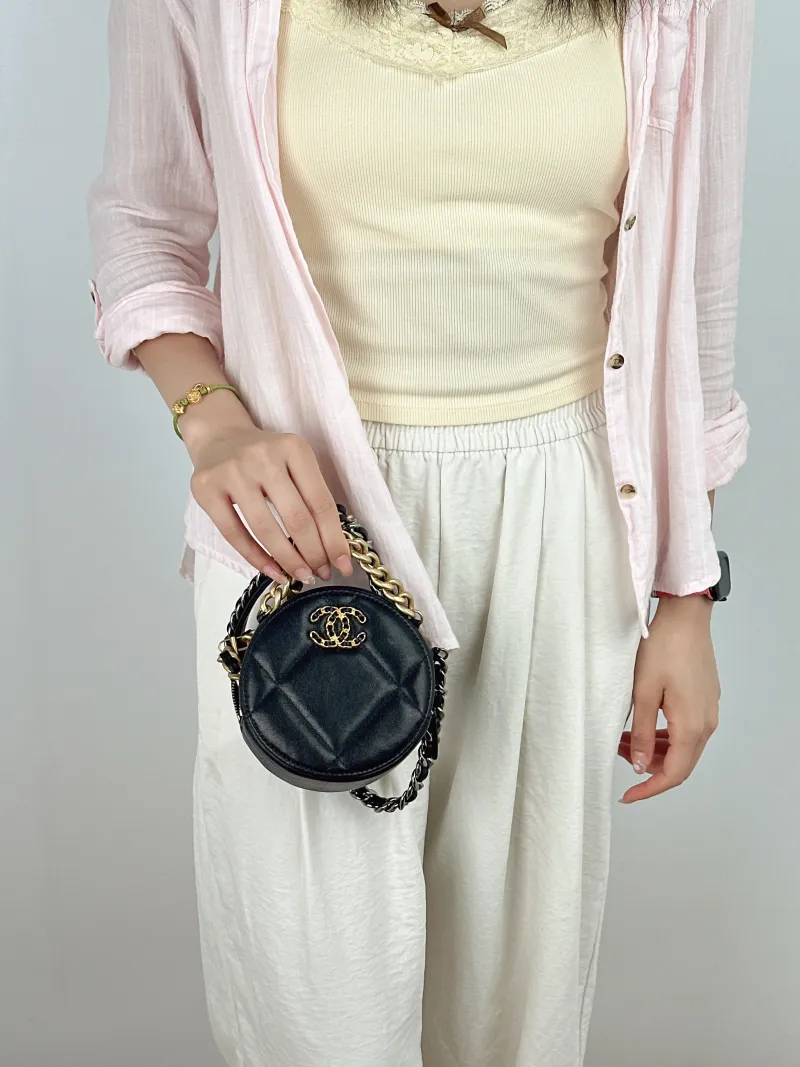 Chanel Crossbody Bag19bag Black Lambskinmini12 × 4.5 × 12 cm — on-model view 1 of 2
