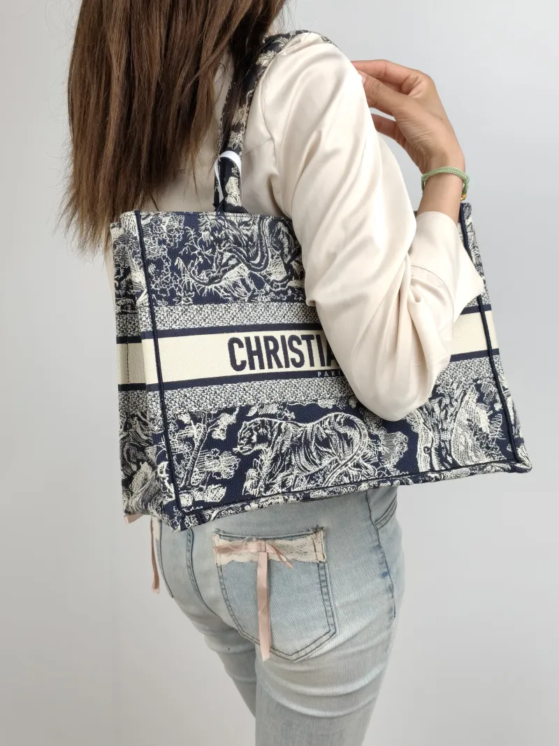 DIOR Top Handle Bag Book Tote Collection · Blue White Canvas Medium 36 × 16.5 × 27.5 cm — on-model view 2 of 2