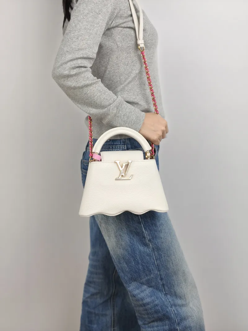 Louis Vuitton Crossbody Bag Capucines White Calfskin Mini 22 × 7.5 × 14 cm — on-model view 3 of 3