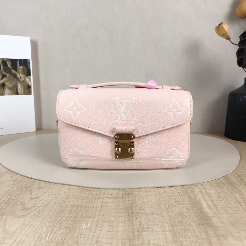 Louis Vuitton Crossbody Bag Pochette Métis East West Monogram Empreinte Embossed Calfskin Small 21.5 × 6 × 13.5 cm