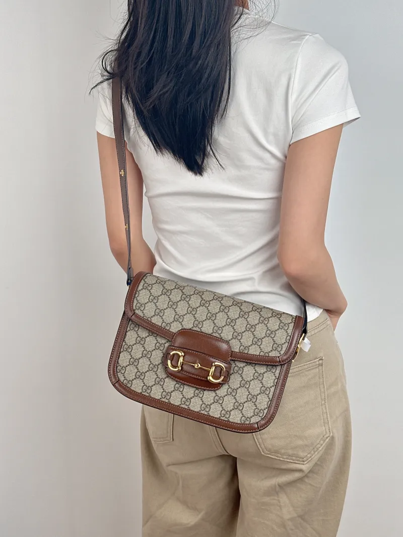 GUCCI Shoulder Bag Horsebit 1955 Horsebit Medium Monogram PVC Medium 25 × 8 × 18 cm — on-model view 2 of 2