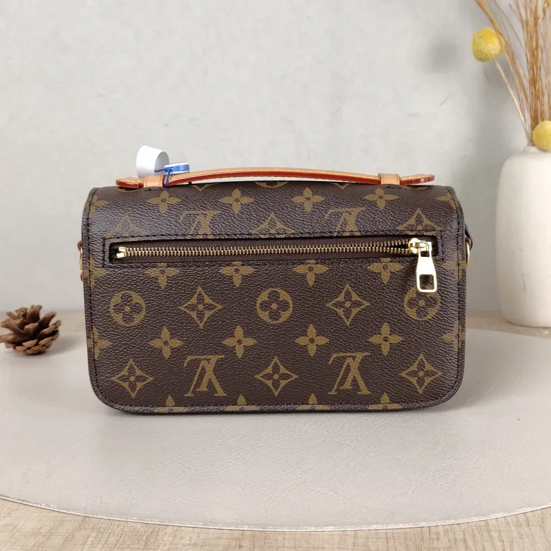 Louis Vuitton Crossbody Bag Pochette Métis East West Monogram PVC Small 21.5 × 6 × 13.5 cm — cover view 2 of 5