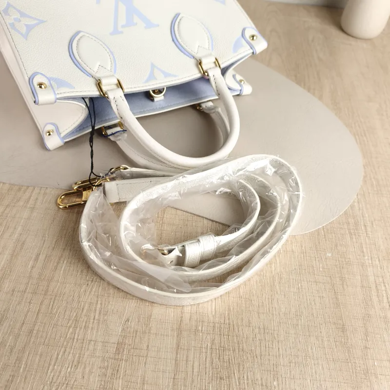 Louis Vuitton Shoulder Bag Onthego White · Blue Monogram Empreinte Embossed Calfskin Small 25 × 11.5 × 19 cm — detail view 5 of 11