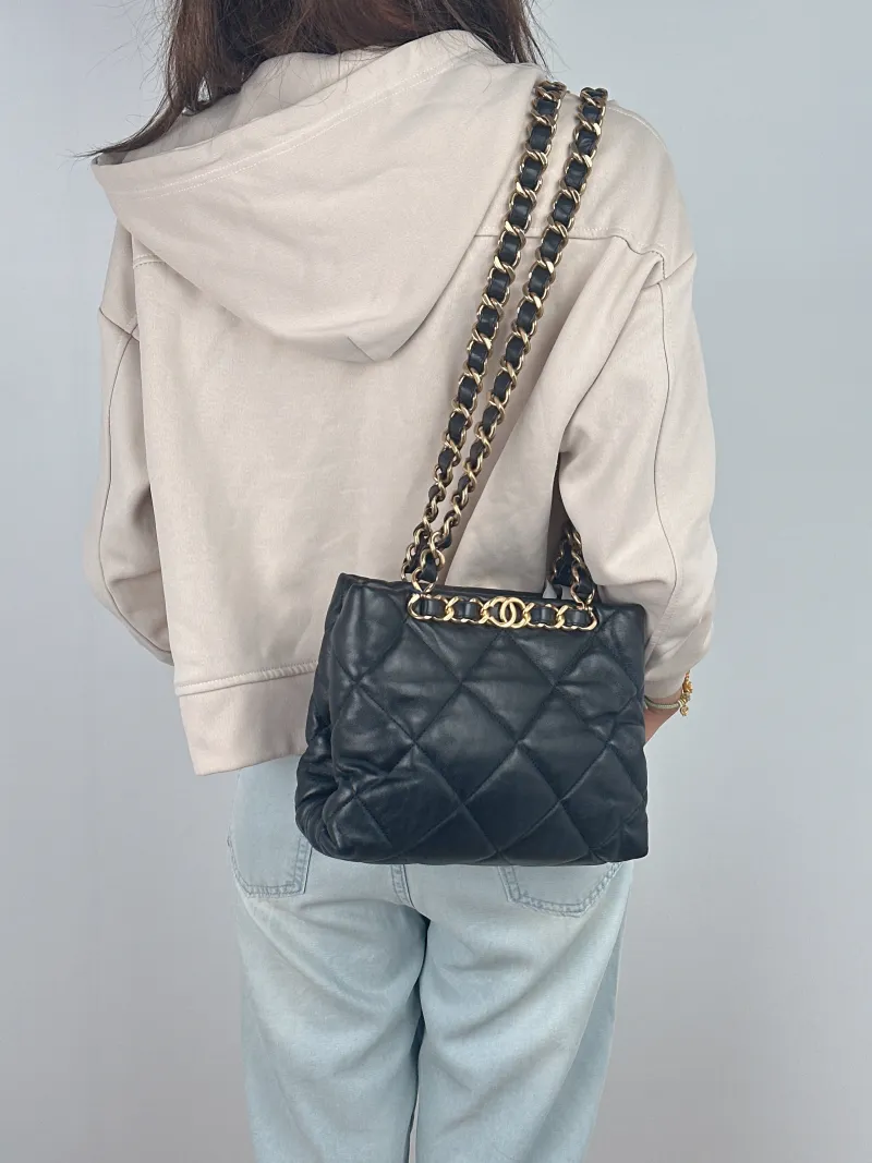 Chanel Shoulder Bag 22b Small Shopping Tote Black Lambskin Small 25 × 10 × 20 cm — on-model view 1 of 2