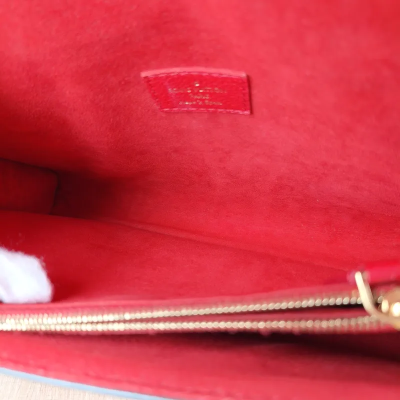 Louis Vuitton Crossbody Bag VICTOIRE Red PVC · Calfskin One Size 27 × 10 × 17 cm — detail view 7 of 13