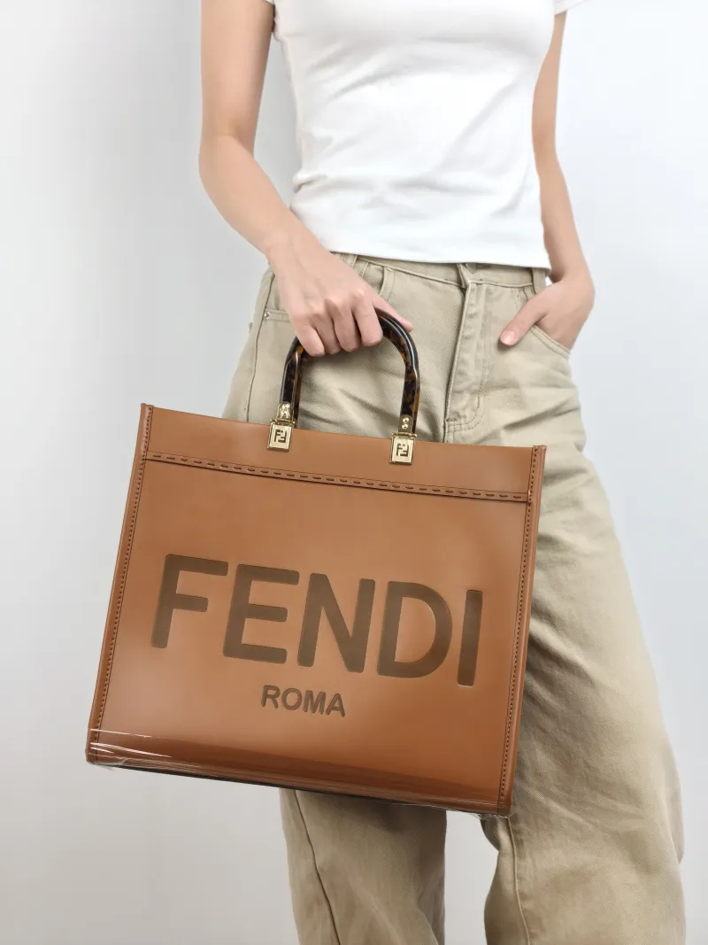 FENDI Top Handle Bag Sunshine Shopping Tote Caramel Calfskin Medium 35 × 17 × 31 cm — on-model view 1 of 2