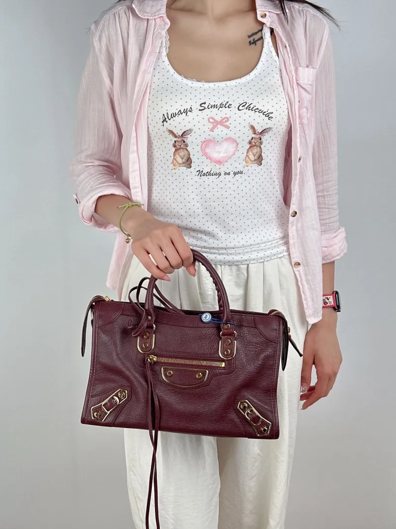 BALENCIAGA Crossbody Bag Classic City Red Lambskin Small30 × 10 × 21 cm — on-model view 3 of 3