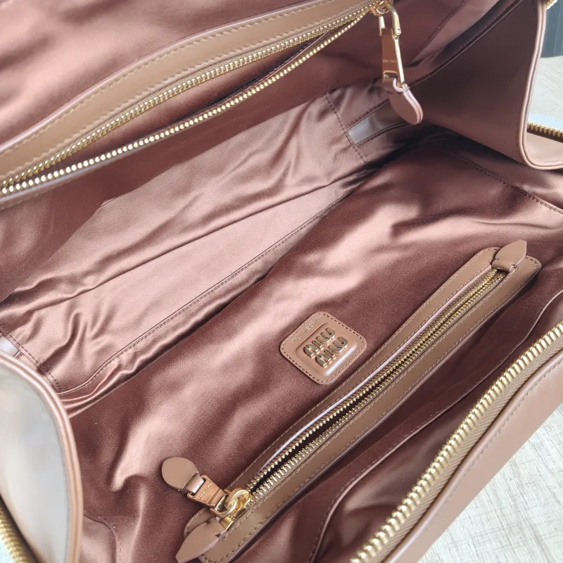 Miumiu Top Handle Bag Beau CC alfskin Large 34 × 10 × 23 cm — detail view 8 of 11