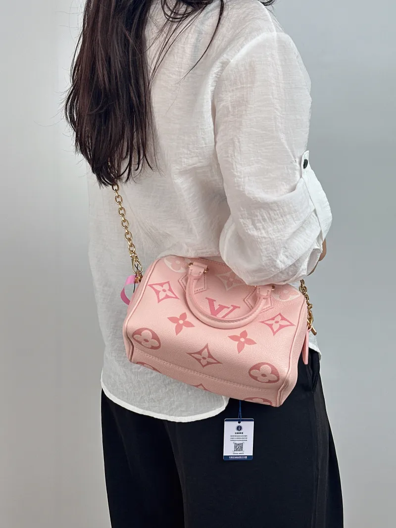 Louis Vuitton Crossbody Bag Speedy20 Pink Empreinte Embossed Calfskin Small 20.5 × 12 × 13.5 cm — on-model view 2 of 2