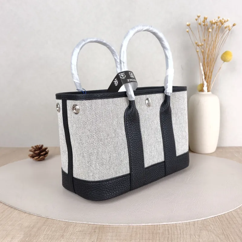 Hermès Top Handle Bag Neo Garden 23 Mini Black · Beige Canvas · Negonda Calfskin Mini 23 × 10 × 16 cm G — cover view 6 of 6